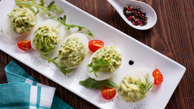 Deviled eggs on a white platter