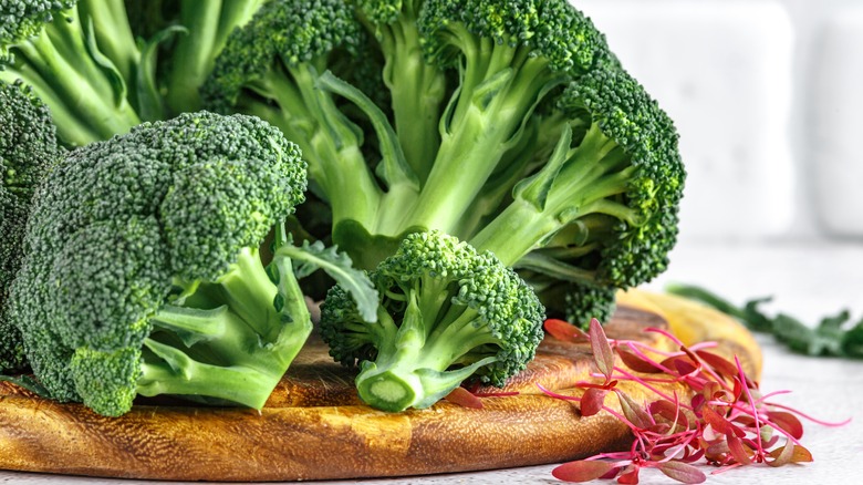 Raw broccoli on a cutting board