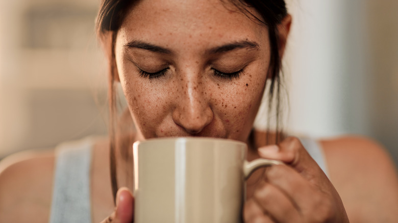 woman drinking coffee