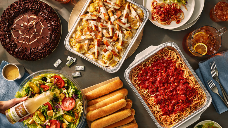 Assorted Olive Garden dishes pasta salad cake