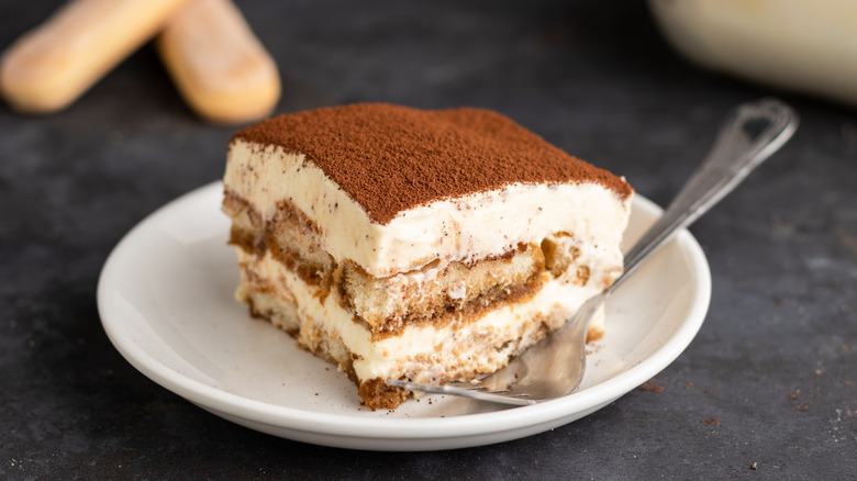 tiramisu served with fork on plate