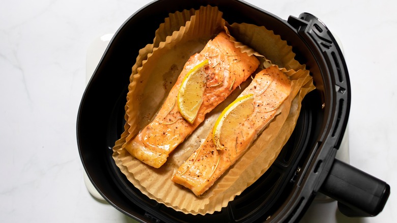 Salmon with lemon in basket