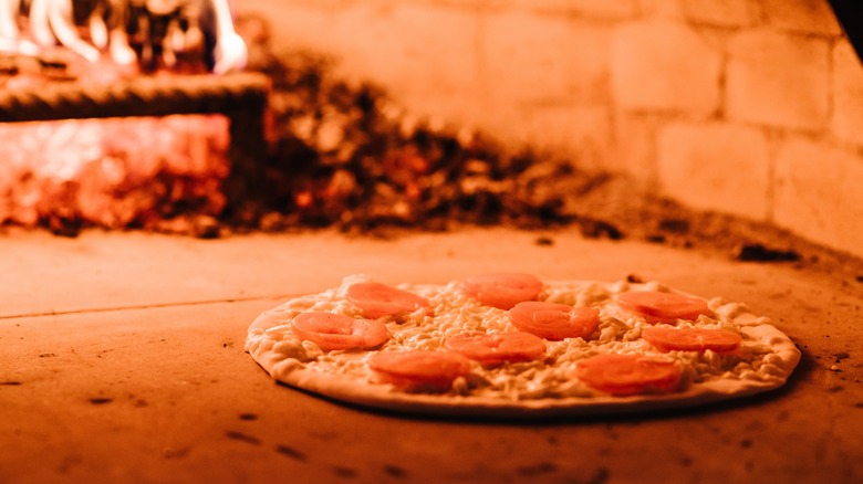 Pizza in brick oven