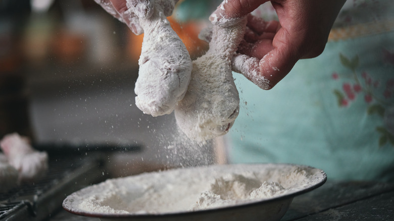 dredging drumsticks in flour