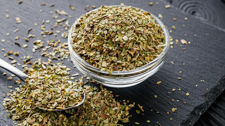 Dried oregano on a black table