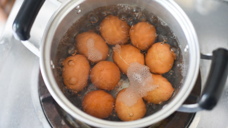 eggs boiling in pot