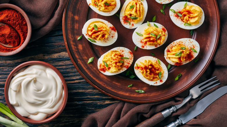 deviled eggs with paprika, mayonnaise