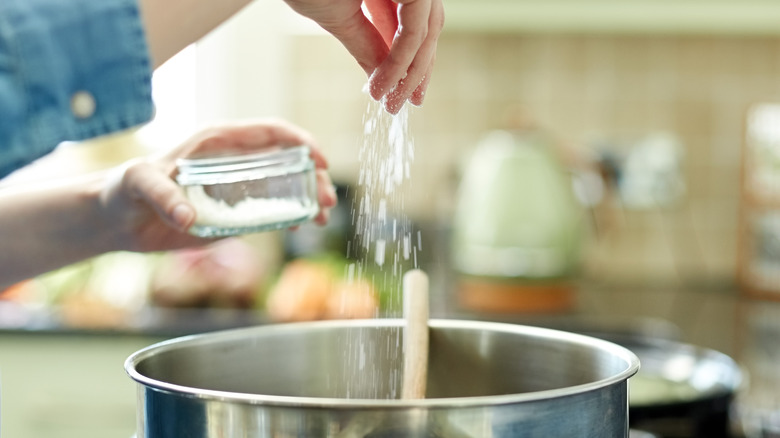 pinch of salt into pot