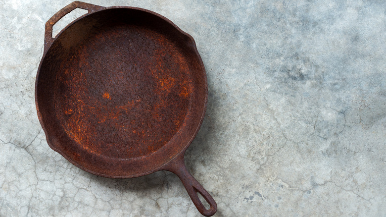 rusty cast iron on cement