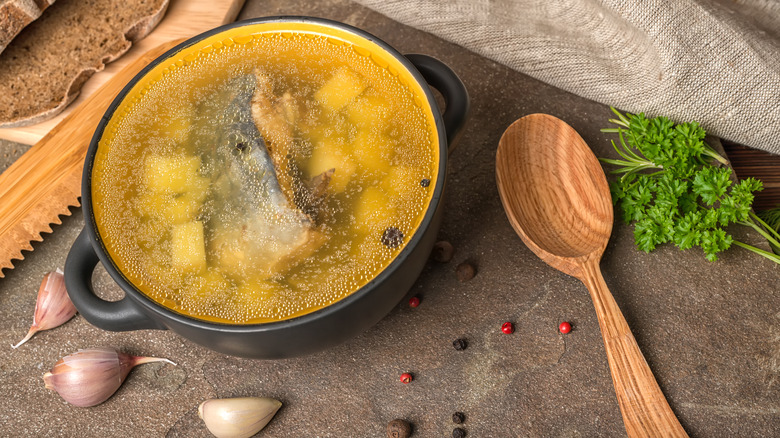 fish and broth in a bowl