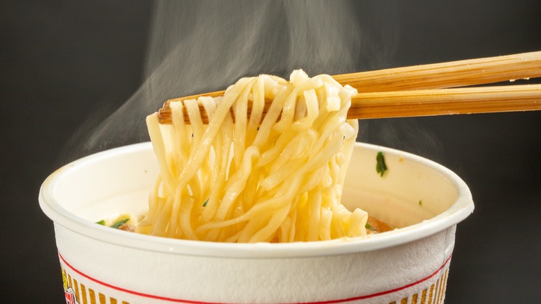 Cup of noodles with chopsticks