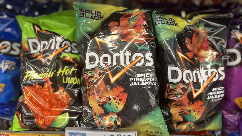 two bags of Doritos Spicy Pineapple Jalapeno