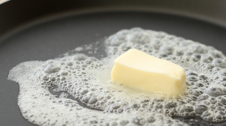 butter melting in pan