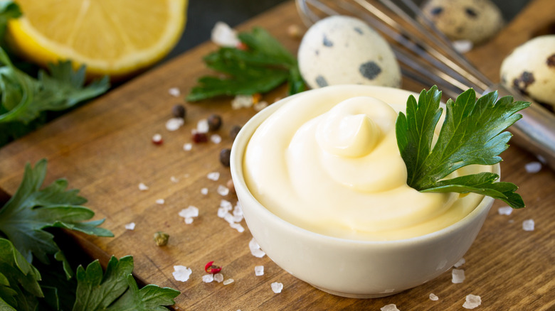 Mayo in bowl on cutting board