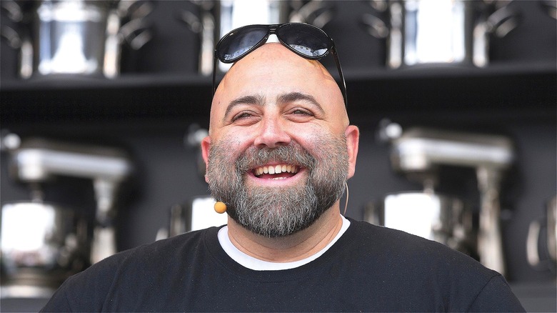 Duff Goldman smiling sunglasses on head