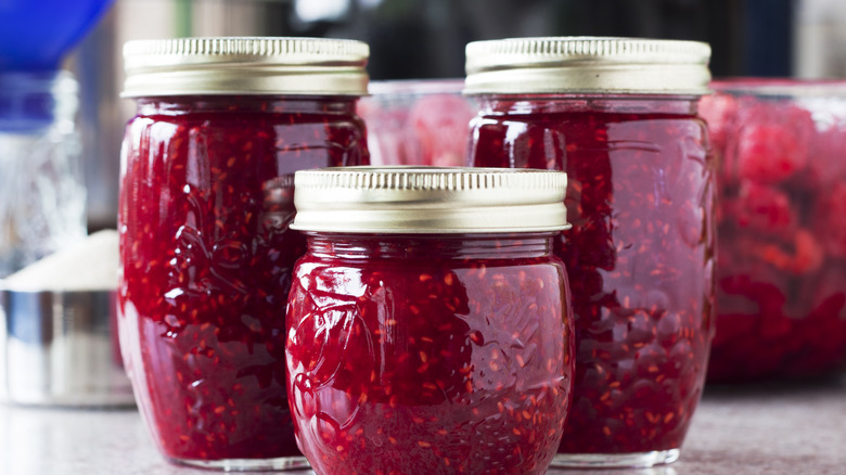 Raspberry jam canned in Ball jars