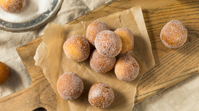 donut holes on cutting board