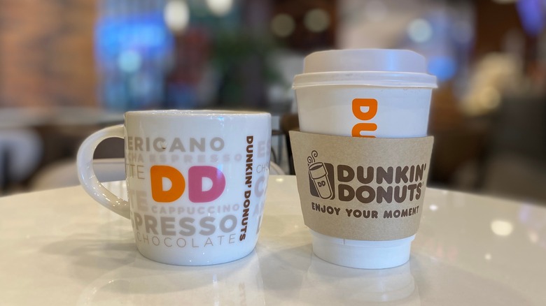 Dunkin' coffee cup and mug