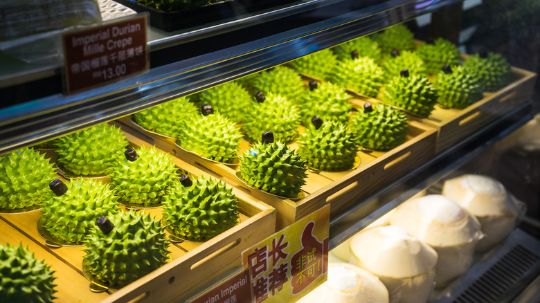 Individual durian cakes in bakery cabinet