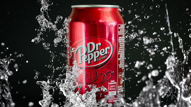 Can of Dr. Pepper in splash
