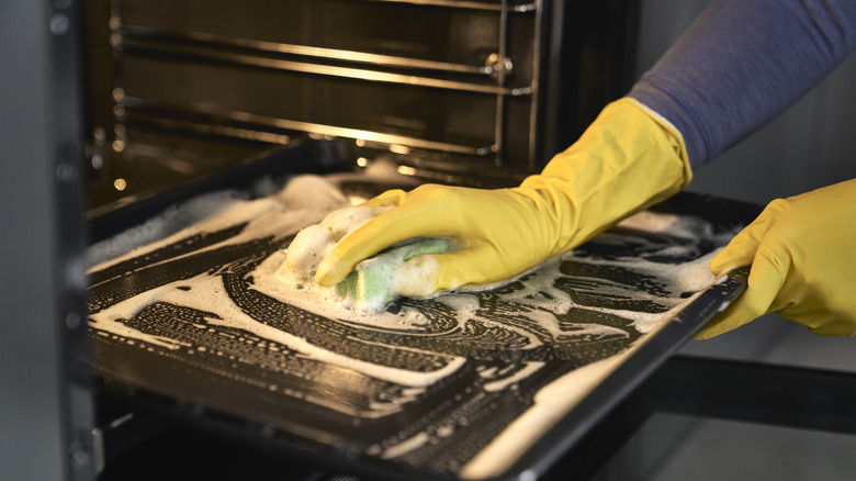 soaping up the inside of an oven