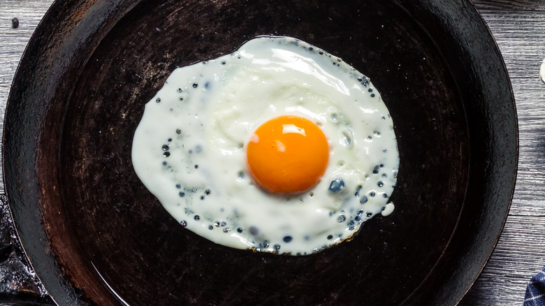 Egg frying in pan