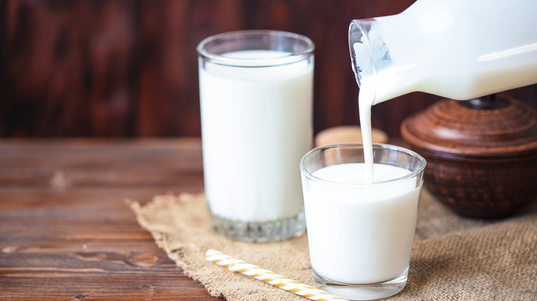 Kefir being poured into glass