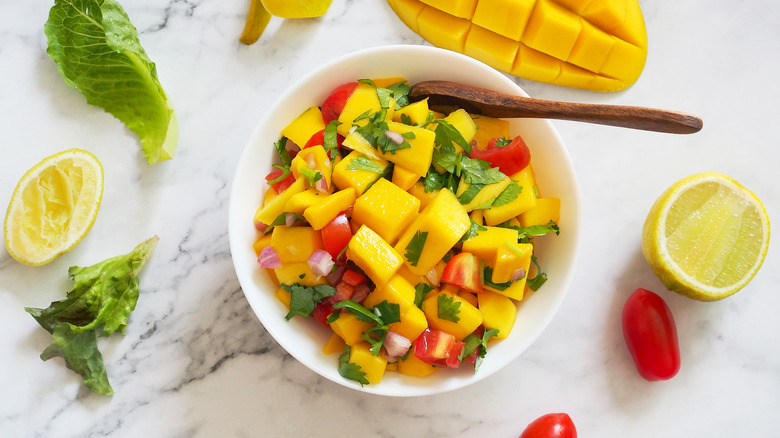 Mango salsa on light background