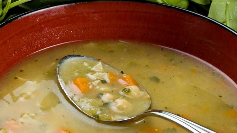 chicken and rice soup with spoon