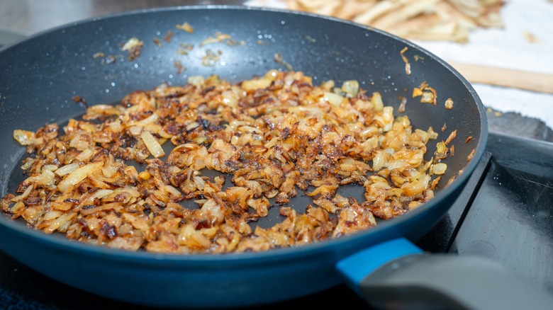 Sauteed onions in a pan