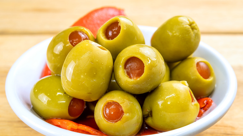 Bowl of green stuffed olives