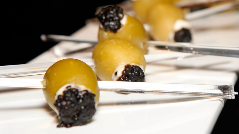 Cheese and caviar stuffed olives