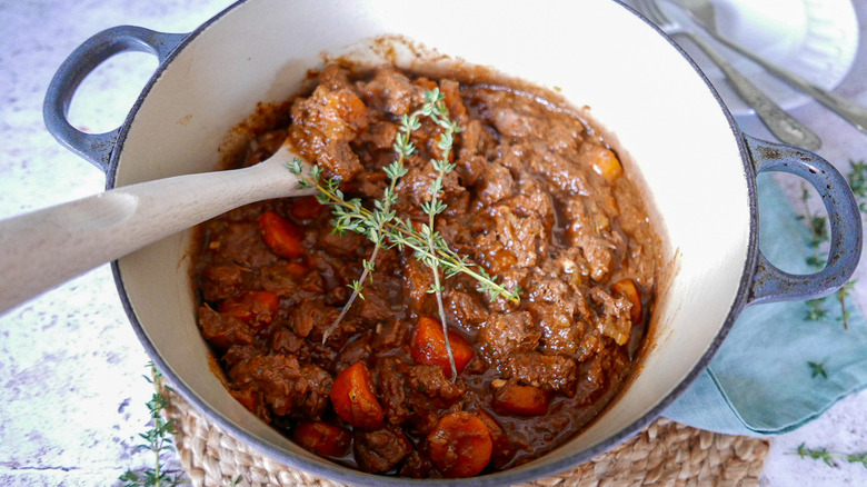 beef stew in white pan
