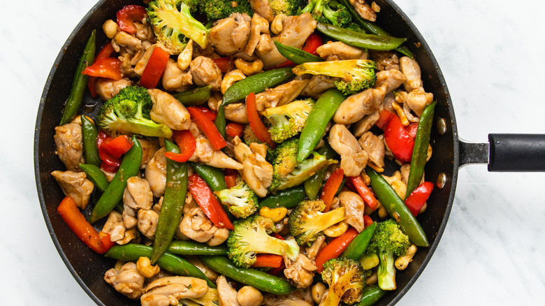 chicken stir fry in a pan