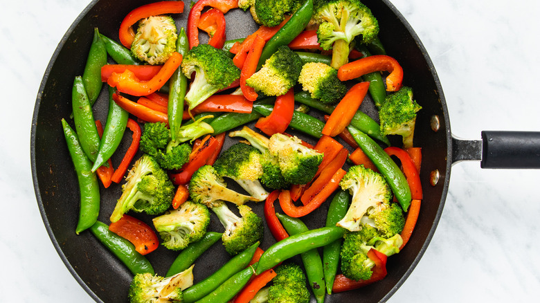 veggies in a frying pan