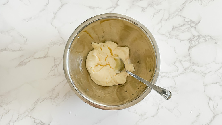 mayo and lemon juice in bowl