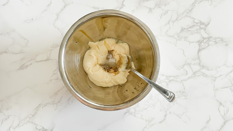 garlic aioli ingredients in bowl before stirring