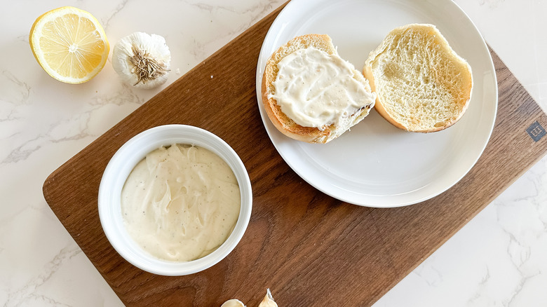 garlic aioli spread on burger bun