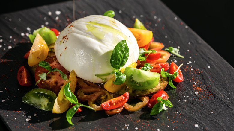 Burrata with tomato and herbs