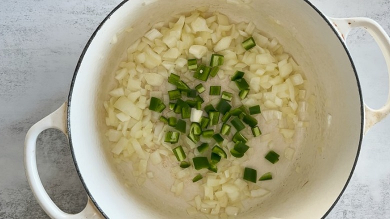 onion and jalapeño in pot