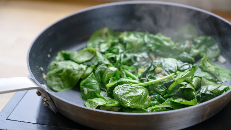 spinach cooking on stove