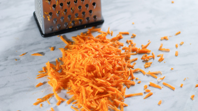 grated carrot shavings on counter