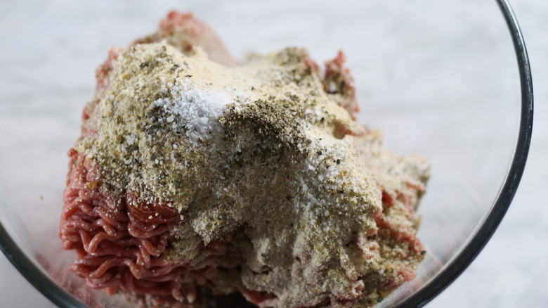 ground beef and spices in bowl