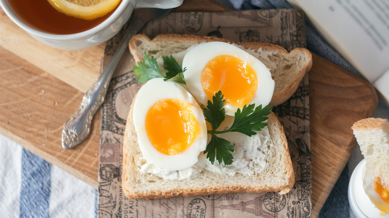 Two soft-boiled eggs on toast