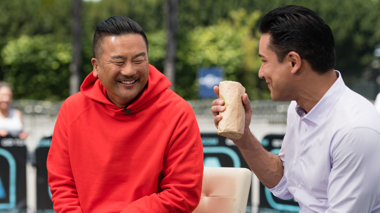 Choi and Mario Lopez laughing