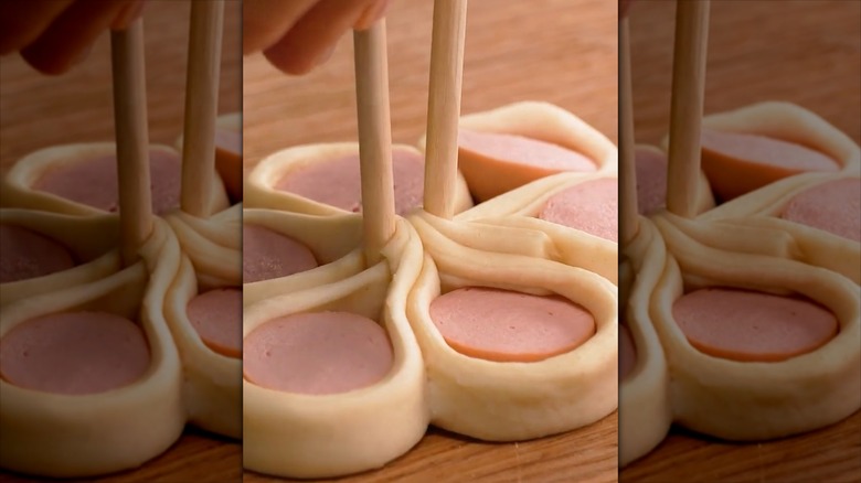 Squares of puff pastry dough