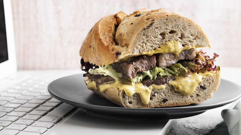 Steak sandwich with mustard