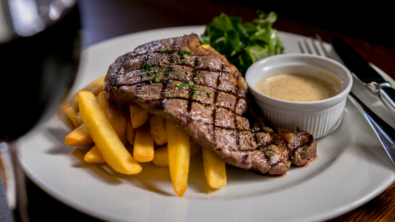 Steak frites with creamy mustard sauce