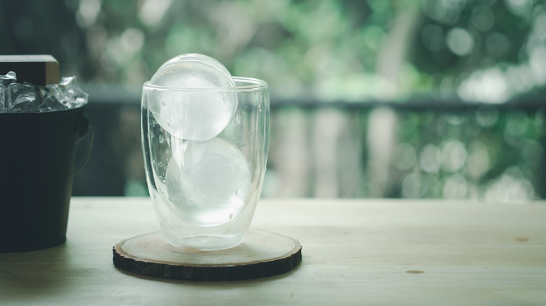 Glass with round ice cubes 