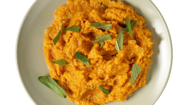 Mashed sweet potatoes with fresh sage